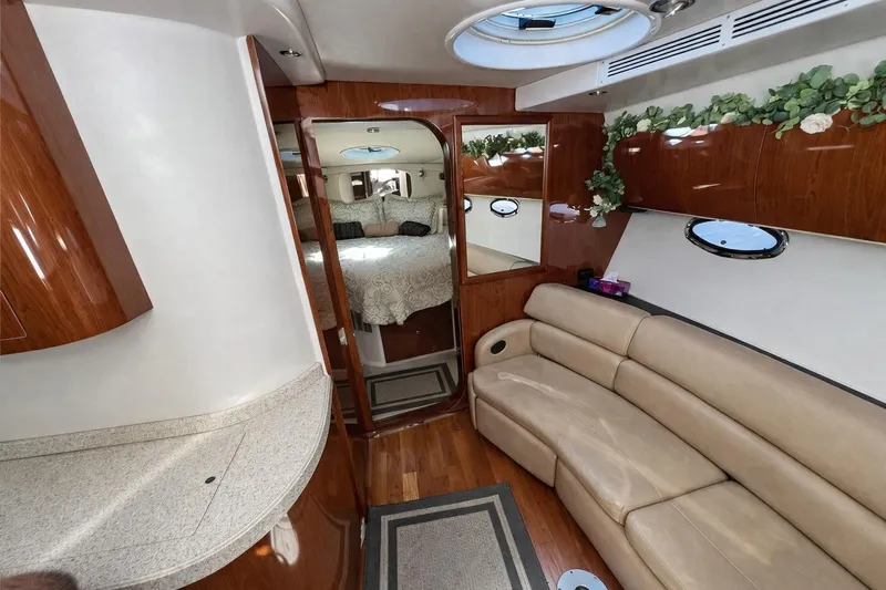 Out With The Buoys II Yacht Photos Pics Luxurious interior of 2009 Regal Commodore 4060 yacht with elegant seating and decor.