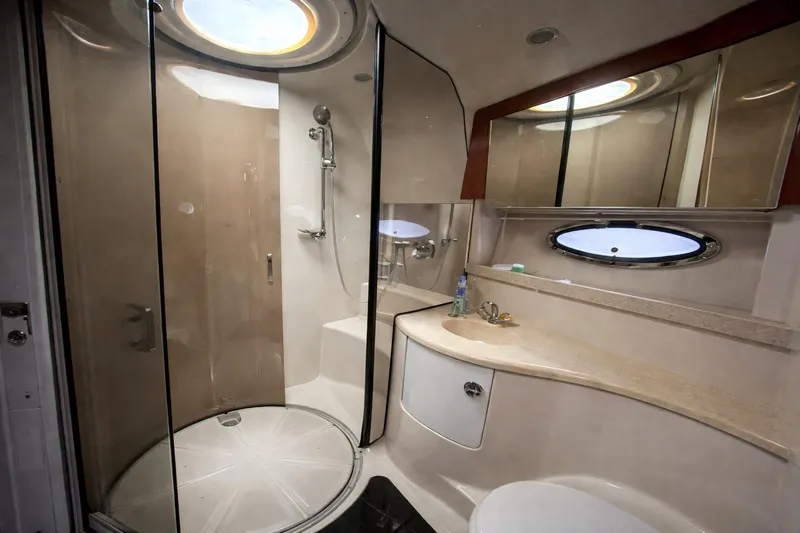 Out With The Buoys II Yacht Photos Pics Luxurious bathroom in 2009 Regal Commodore 4060 yacht with shower and vanity.