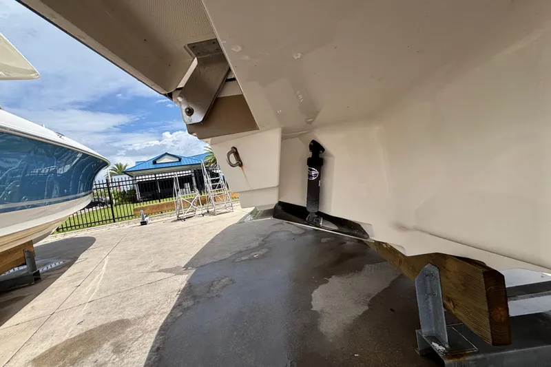  Yacht Photos Pics 2018 Sea Ray SLX 310 Outboard boat on trailer, showcasing hull and surroundings.