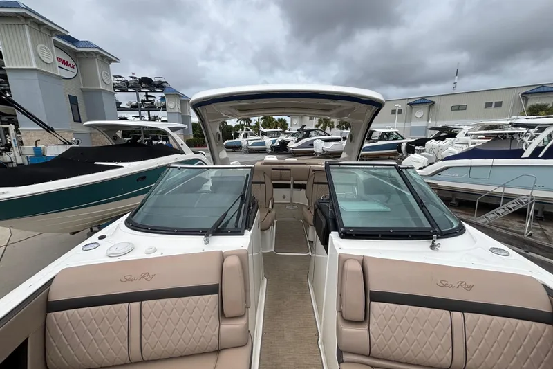  Yacht Photos Pics 2018 Sea Ray SLX 310 Outboard boat with luxurious seating and sleek design.