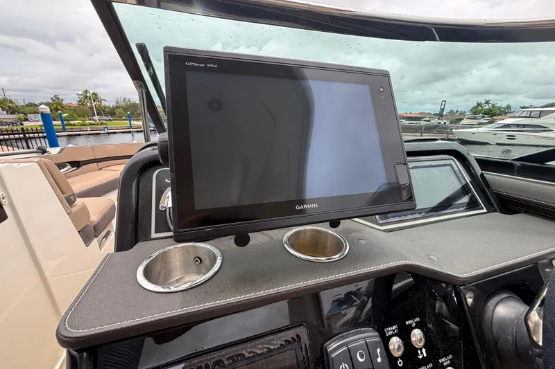  Yacht Photos Pics Dashboard of 2018 Sea Ray SLX 310 Outboard with Garmin GPS display.