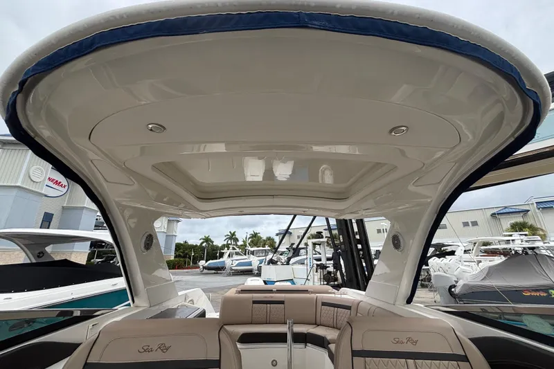  Yacht Photos Pics 2018 Sea Ray SLX 310 Outboard boat interior with sleek design and comfortable seating.