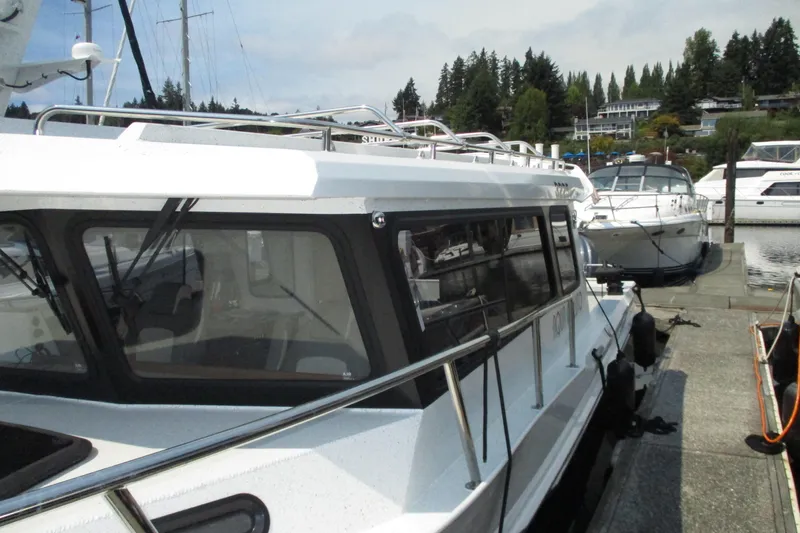  Yacht Photos Pics 2023 KingFisher 3225 GFX Offshore boat docked at marina.