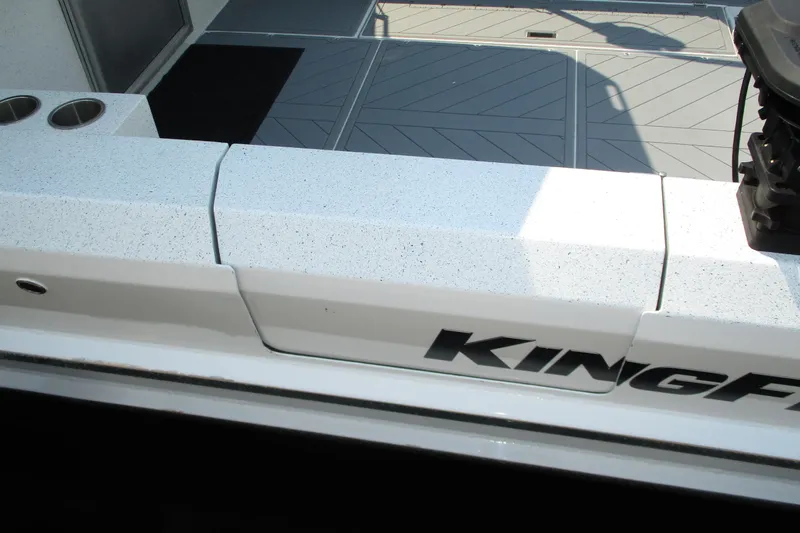  Yacht Photos Pics 2023 KingFisher 3225 GFX Offshore boat deck with logo and cup holders.