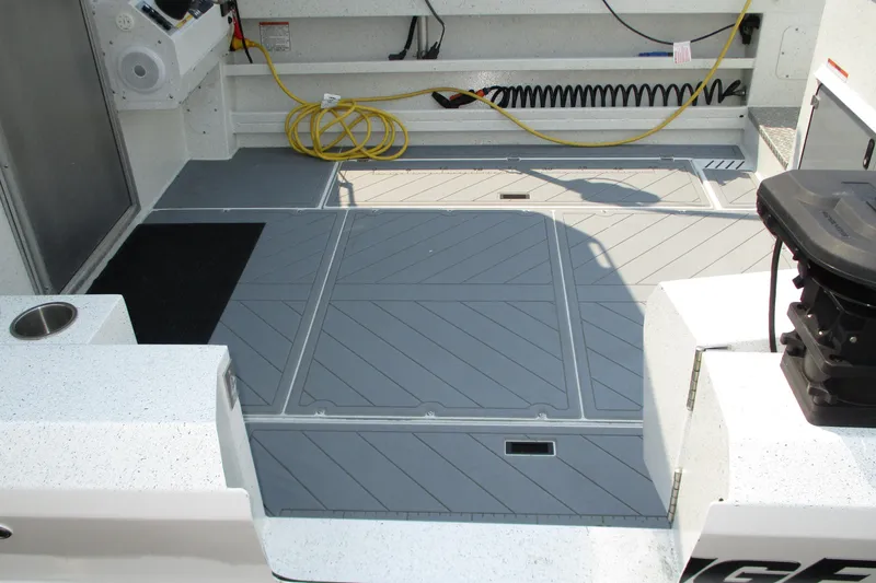  Yacht Photos Pics 2023 KingFisher 3225 GFX Offshore boat deck with storage compartments and equipment.