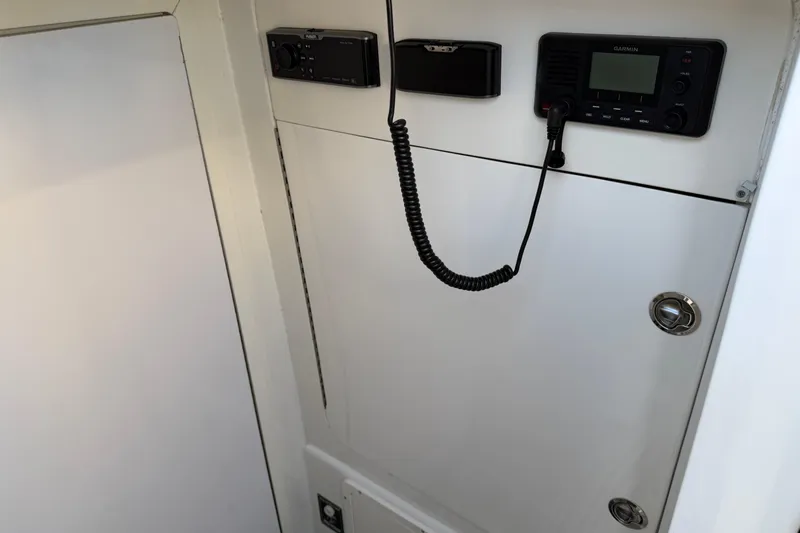  Yacht Photos Pics 2019 Midnight Express 43 Open boat interior with communication equipment.