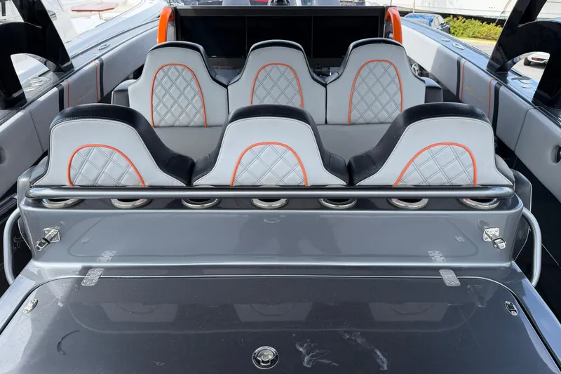  Yacht Photos Pics 2019 Midnight Express 43 Open boat interior with stylish seating and cup holders.