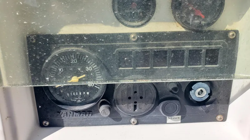  Yacht Photos Pics Dashboard of a 1999 Beneteau Oceanis 44 CC sailboat with gauges and controls.