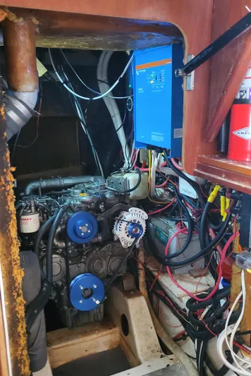  Yacht Photos Pics Engine room of 1999 Beneteau Oceanis 44 CC sailboat with visible wiring and components.