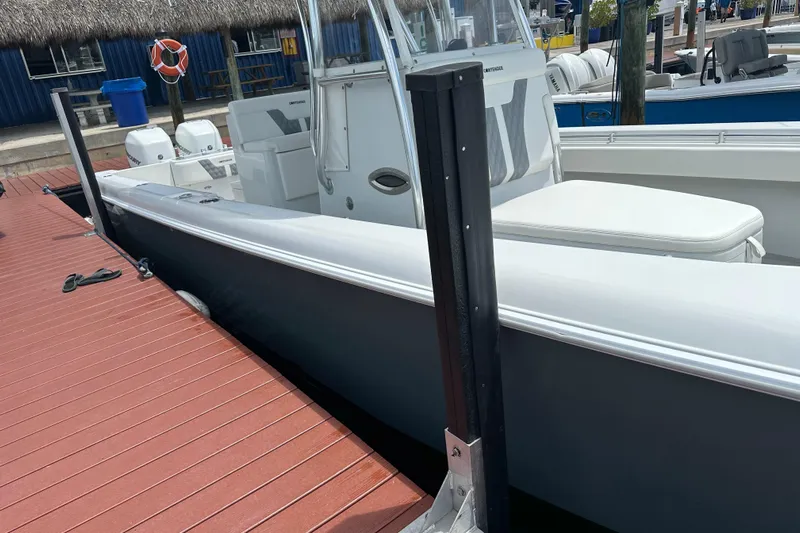  Yacht Photos Pics 2019 Contender 35 ST boat docked at marina with dual engines.