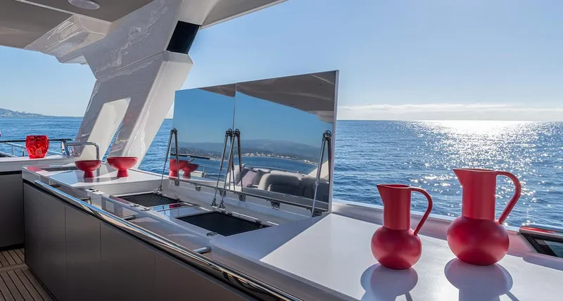Absolute Navetta 75 Yacht Photos Pics Luxury yacht Absolute NAVETTA 75, 2025 model, featuring a sleek outdoor kitchen with ocean view.