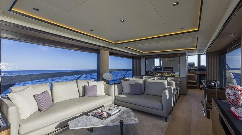 Absolute Navetta 75 Yacht Photos Pics Luxurious interior of 2025 Absolute NAVETTA 75 yacht with ocean view.