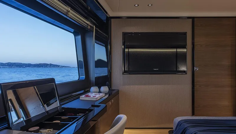 Absolute Navetta 75 Yacht Photos Pics Luxurious interior of 2025 Absolute NAVETTA 75 yacht with ocean view and modern amenities.