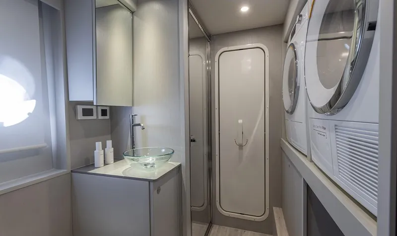 Absolute Navetta 75 Yacht Photos Pics Luxurious bathroom in 2025 Absolute NAVETTA 75 yacht with modern fixtures and appliances.