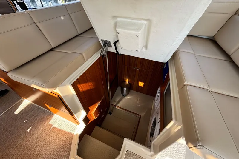  Yacht Photos Pics Interior view of 2022 Ranger Tugs R-43 CB, featuring stairs and seating area.
