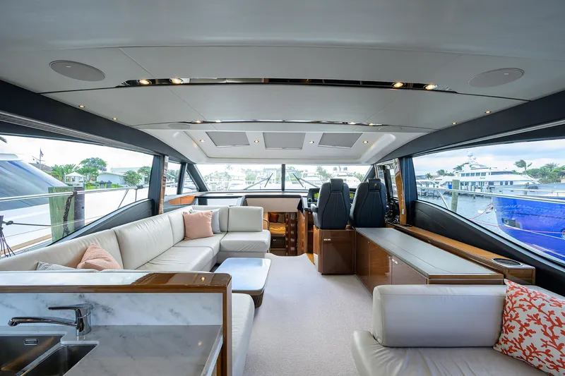 Gallant Lady Yacht Photos Pics Luxurious interior of 2018 Princess 65S yacht with modern seating and panoramic windows.