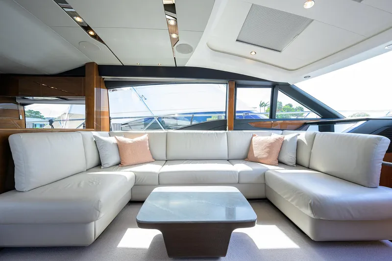 Gallant Lady Yacht Photos Pics Luxurious interior of 2018 Princess 65S yacht with white leather seating and modern design.