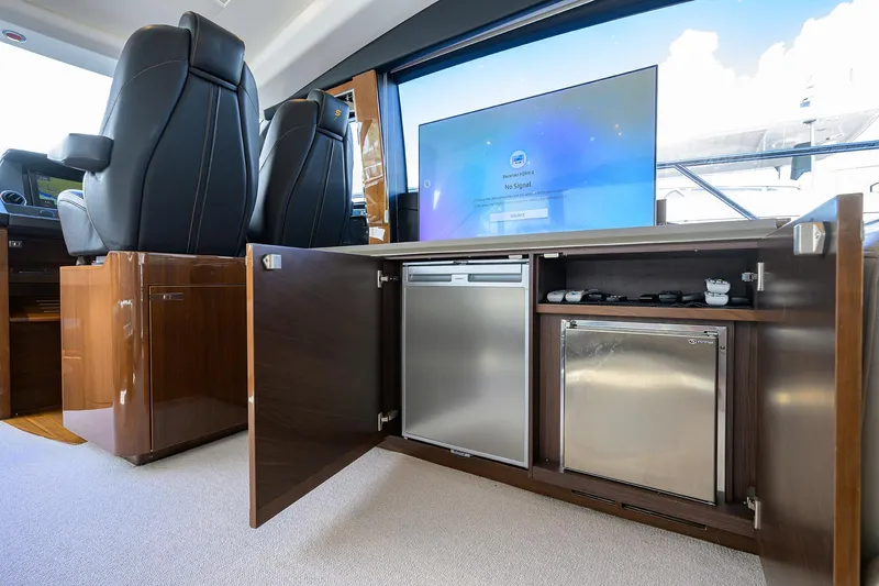 Gallant Lady Yacht Photos Pics Luxurious interior of 2018 Princess 65S yacht with modern appliances and seating.