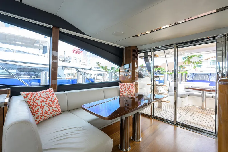 Gallant Lady Yacht Photos Pics Luxurious interior of 2018 Princess 65S yacht with elegant seating and dining area.