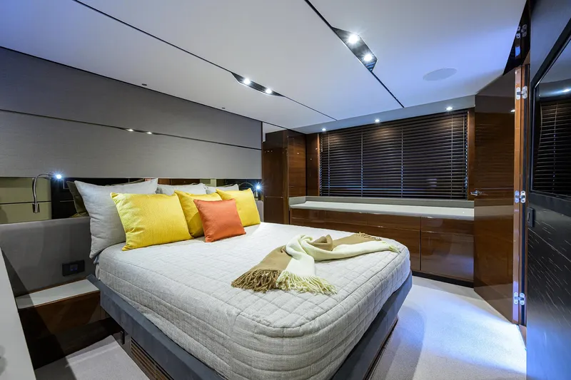 Gallant Lady Yacht Photos Pics Luxurious bedroom interior of 2018 Princess 65S yacht with modern decor.