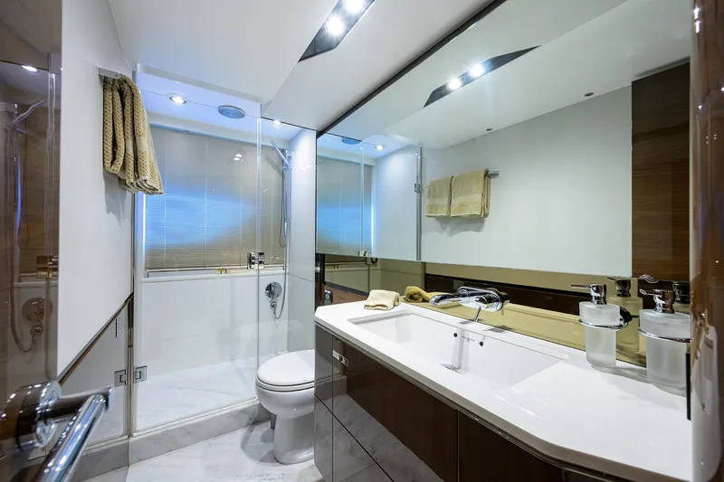 Gallant Lady Yacht Photos Pics Luxurious bathroom in 2018 Princess 65S yacht with modern fixtures and elegant design.