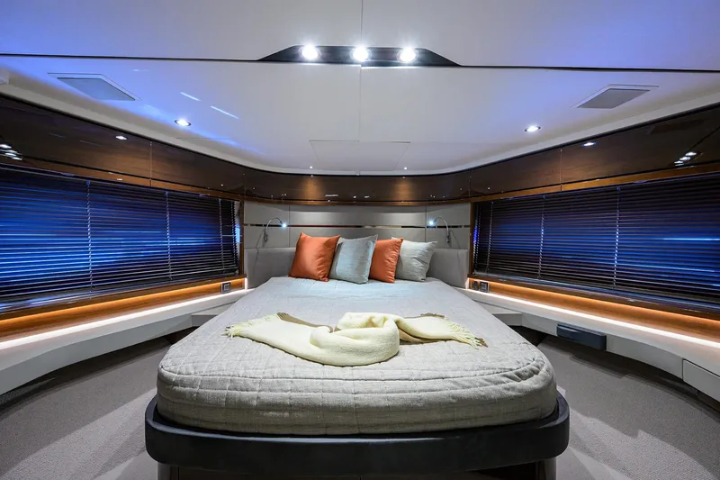 Gallant Lady Yacht Photos Pics Luxurious bedroom interior of 2018 Princess 65S yacht with modern design and ambient lighting.