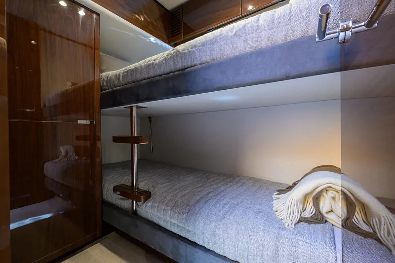 Gallant Lady Yacht Photos Pics Bunk beds in 2018 Princess 65S yacht cabin with cozy blankets.