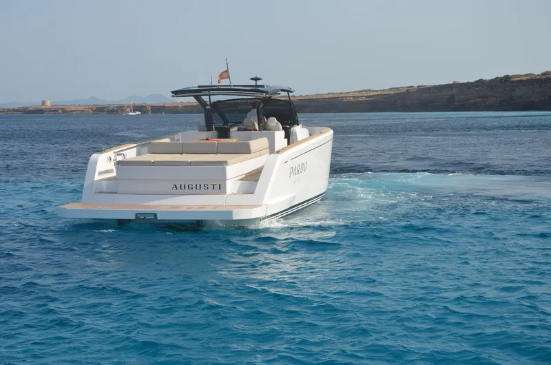 Ban Ban Yacht Photos Pics 2023 Pardo Yachts 50 cruising on clear blue waters, rear view.