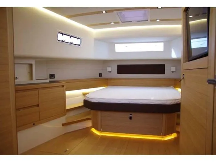 Ban Ban Yacht Photos Pics Luxurious interior of 2023 Pardo Yachts 50, featuring modern wood finishes and ambient lighting.