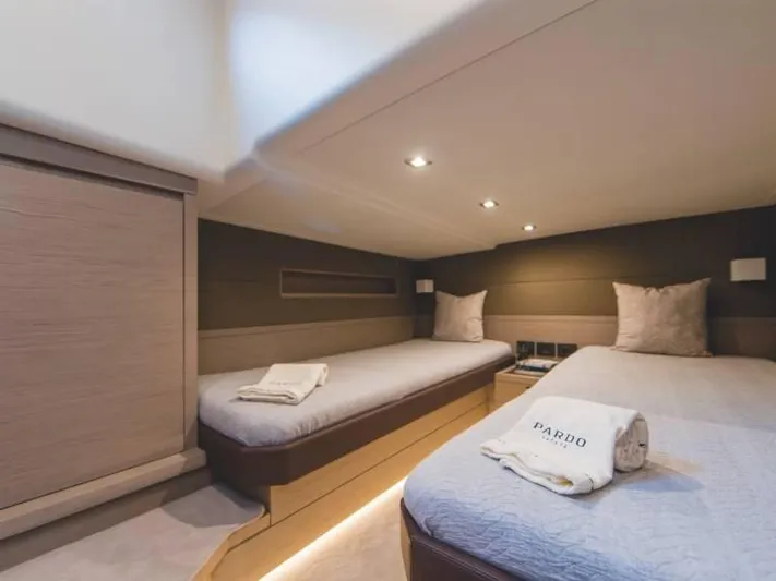 Ban Ban Yacht Photos Pics Luxurious cabin interior of 2023 Pardo Yachts 50 with twin beds and elegant lighting.