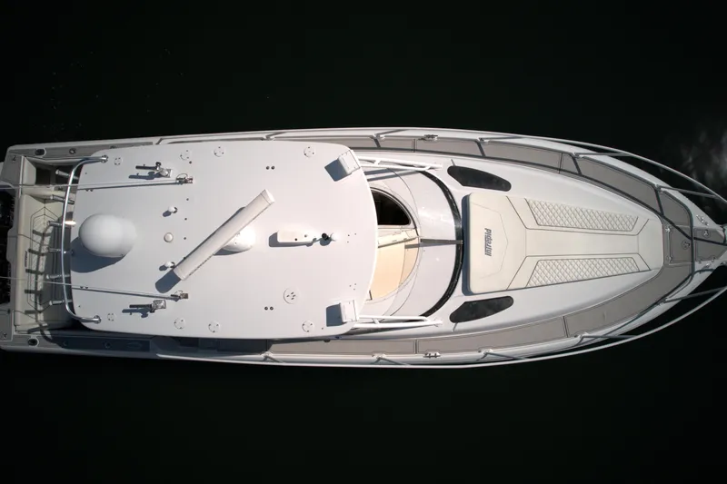 377 Walkaround Cuddy Yacht Photos Pics Aerial view of a 2002 Intrepid 377 Walkaround Cuddy boat.