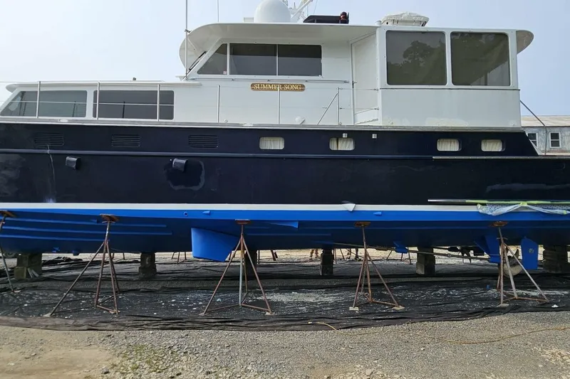 Summer Song Yacht Photos Pics 1969 Derecktor 68 Hunt Motor Yacht on dry dock for maintenance.