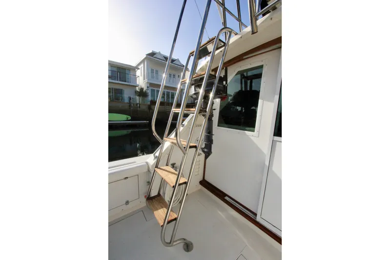 La Dorada Yacht Photos Pics custom welded Stainless steel ladder on 1980 Bertram 35 Flybridge