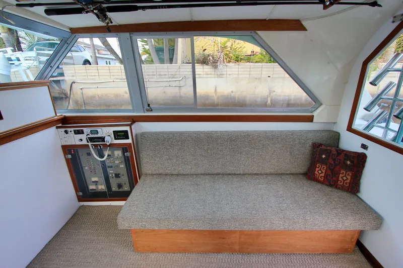 La Dorada Yacht Photos Pics Starboard side convertible sofa. Custom Interior by Crystaliner Corp.