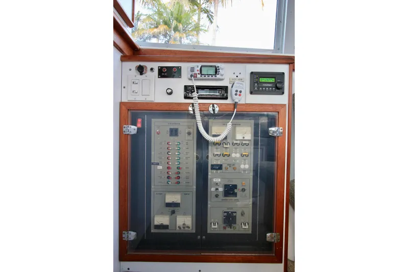 La Dorada Yacht Photos Pics Main electrical panel with generator controls, stereo, inverter, and VHF radio.