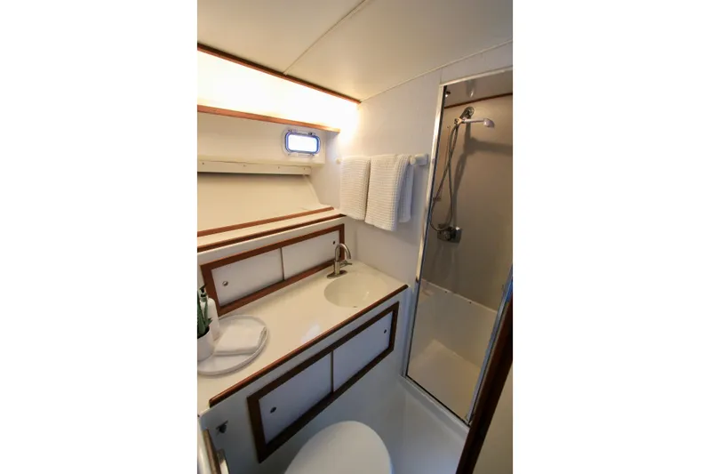 La Dorada Yacht Photos Pics Electric MasterFlush head, sink, enclosed shower and storage.