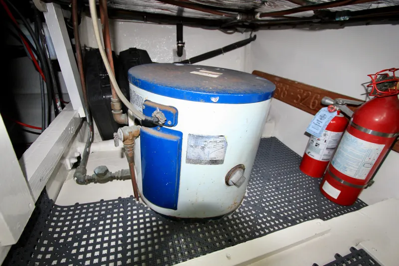 La Dorada Yacht Photos Pics port side water heater, and storage.
