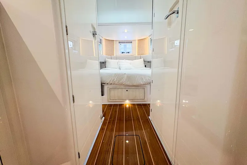  Yacht Photos Pics Manufacturer Provided Image: Luxurious cabin interior of 2026 HCB 56 Suenos GIX with elegant wood flooring.