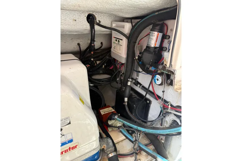  Yacht Photos Pics 2008 Grady-White Marlin 300 engine compartment with wiring and components.