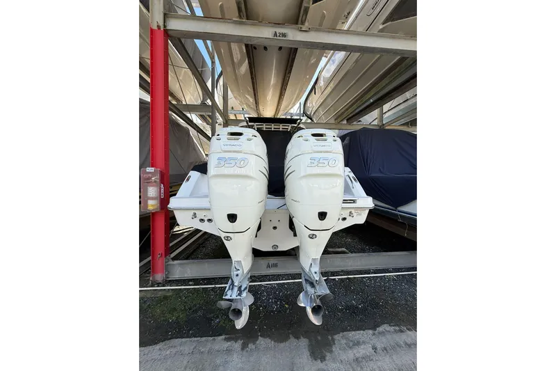  Yacht Photos Pics 2016 Boston Whaler 330 Outrage with twin 350 Verado engines in storage.
