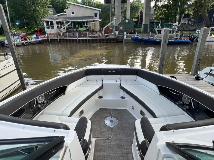  Yacht Photos Pics 2016 Sea Ray 350 SLX boat docked, featuring spacious seating and modern design.