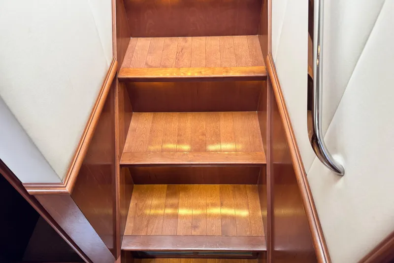  Yacht Photos Pics Wooden staircase with handrail inside 2009 Ovation 52 yacht.