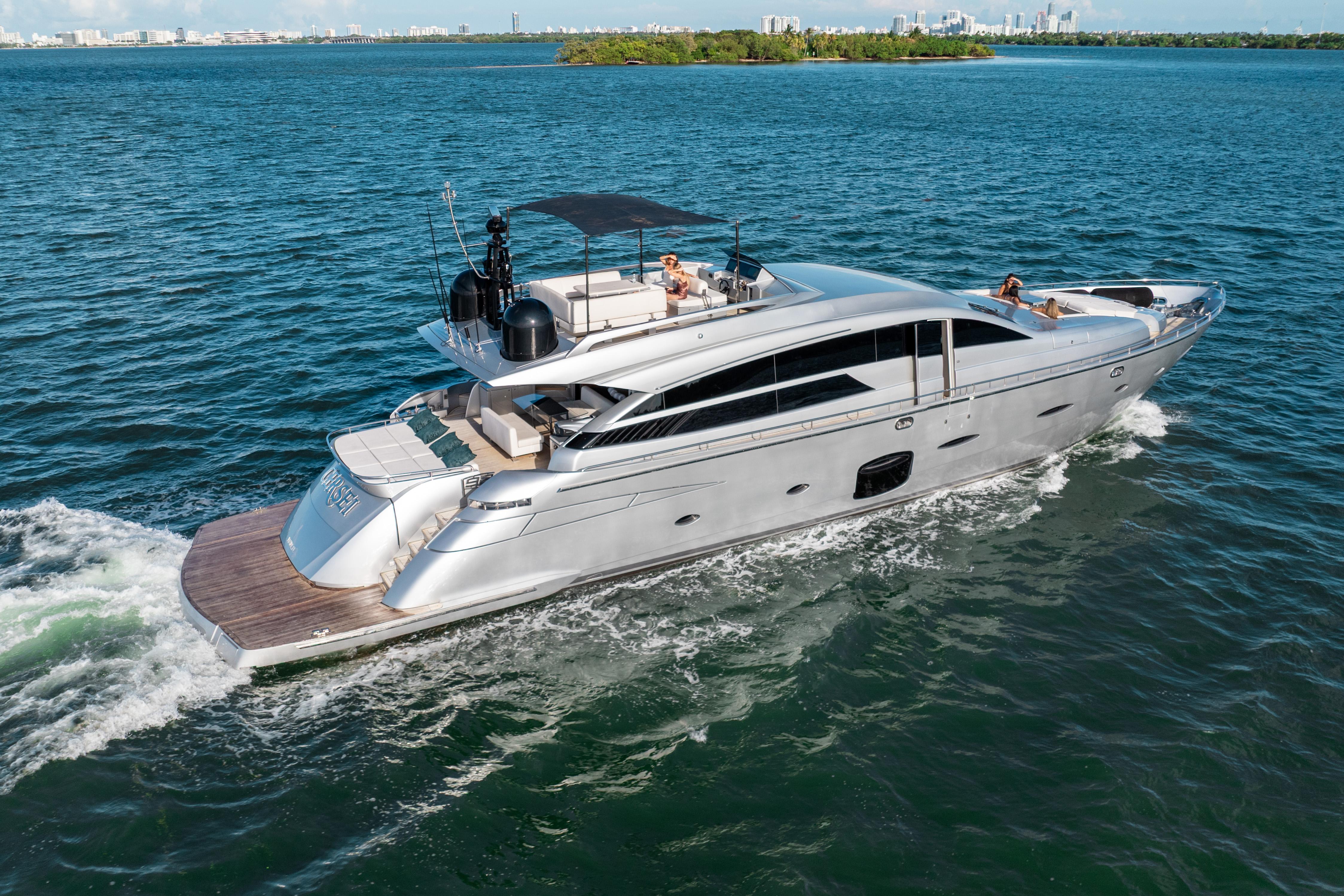 Luxury 2012 Pershing 92 yacht cruising on open water, showcasing sleek design and elegance.