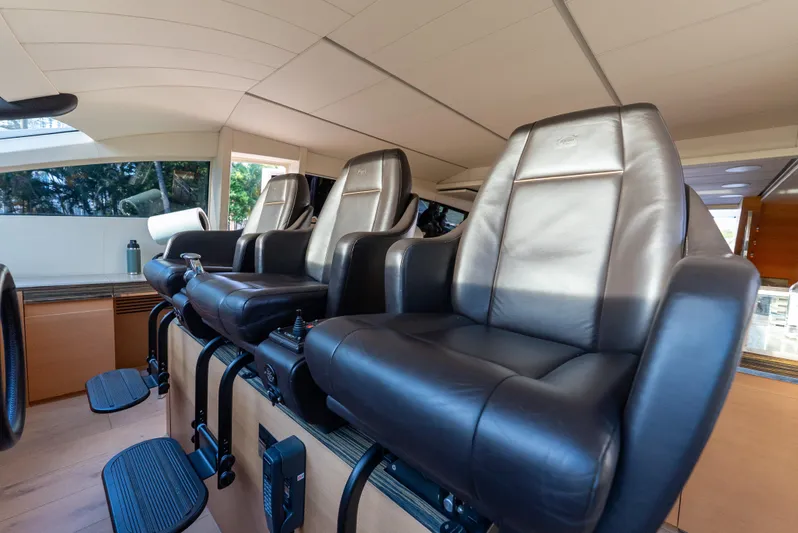  Yacht Photos Pics Luxurious leather seating in a 2012 Pershing 92 yacht interior.