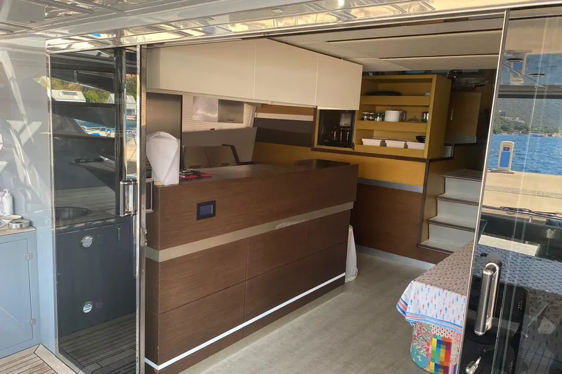  Yacht Photos Pics Interior of 2012 Sunreef 60 yacht with modern kitchen and sleek design.