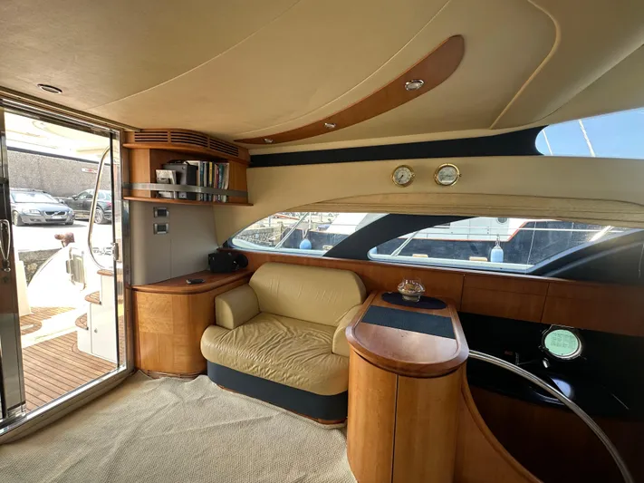 Azimut Benetti Fly 50 Yacht Photos Pics Luxurious interior of a 2006 Azimut 50 yacht with elegant wood and leather furnishings.