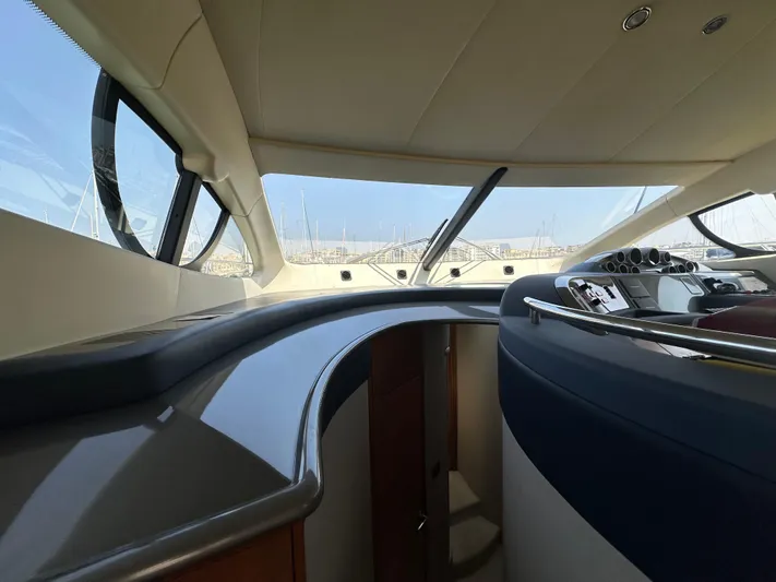 Azimut Benetti Fly 50 Yacht Photos Pics Interior view of 2006 Azimut 50 yacht cockpit with modern design and panoramic windows.