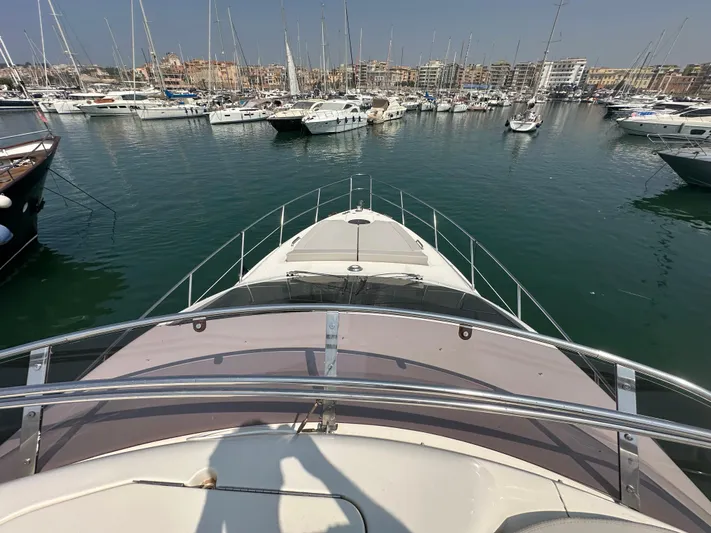 Azimut Benetti Fly 50 Yacht Photos Pics Bow view of 2006 Azimut 50 yacht docked in a marina.