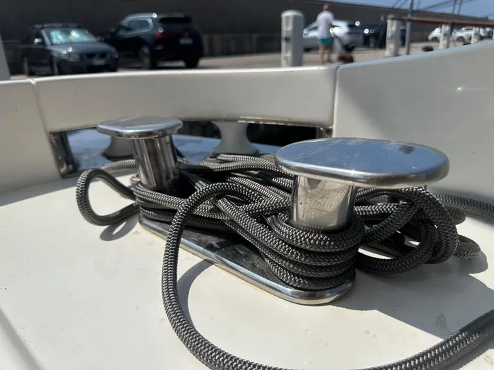 Azimut Benetti Fly 50 Yacht Photos Pics Close-up of mooring cleats with rope on a 2006 Azimut 50 yacht.