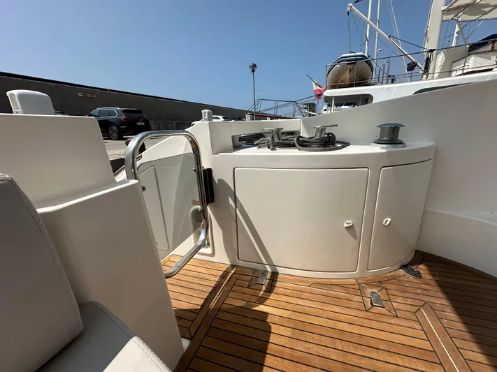 Azimut Benetti Fly 50 Yacht Photos Pics 2006 Azimut 50 yacht deck with teak flooring and sleek white cabinetry.